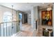 Bright hallway with hardwood floors, chandelier, fresh paint, and decorative artwork at 3167 Blairhill Ct, Atlanta, GA 30340