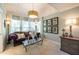 Sitting room features custom ceiling, large windows, new carpet, and gold chandelier at 3167 Blairhill Ct, Atlanta, GA 30340