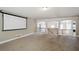 Upstairs bonus room perfect for entertaining with a large projector screen at 3345 Palmer Lake Pointe, Douglasville, GA 30135