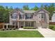 Beautiful brick two-story home with manicured lawn and attached two car garage at 3345 Palmer Lake Pointe, Douglasville, GA 30135