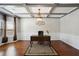 Bright office with coffered ceiling, hardwood floors, and classic desk at 3345 Palmer Lake Pointe, Douglasville, GA 30135