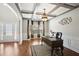 Bright office with coffered ceiling, hardwood floors, and classic desk at 3345 Palmer Lake Pointe, Douglasville, GA 30135