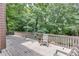 A back deck with green views at 380 Chandler Ct, Sugar Hill, GA 30518