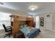 Bright bedroom features carpet, a bunkbed, and a door leading to another room at 380 Chandler Ct, Sugar Hill, GA 30518