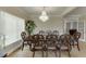 Bright dining room features a classic chandelier and a large window, perfect for Gathering gatherings at 380 Chandler Ct, Sugar Hill, GA 30518