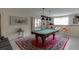 Spacious game room with a pool table and seating at 380 Chandler Ct, Sugar Hill, GA 30518