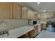 Functional kitchen offers ample cabinet space, essential appliances, and a clean design at 380 Chandler Ct, Sugar Hill, GA 30518