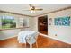 Cozy breakfast nook with view to kitchen featuring hardwood floors and natural light streaming through windows at 426 College E St, Bowdon, GA 30108