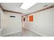 Neutral bonus room or office space with natural light and tile floors at 426 College E St, Bowdon, GA 30108