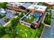 View of outdoor rooftop putting green, outdoor seating and dining area and brick building at 451 Burton Dr # 32, Alpharetta, GA 30009