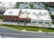 View of building with popular retail stores, street parking and landscaping at 451 Burton Dr # 32, Alpharetta, GA 30009