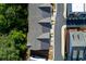 Aerial view of neighborhood rooftops and road at 451 Burton Dr # 32, Alpharetta, GA 30009