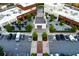 Aerial view of shopping center with ample parking, landscaping and outdoor seating available at 451 Burton Dr # 32, Alpharetta, GA 30009