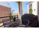 Cozy outdoor living space featuring metal furniture and privacy, perfect for relaxing and entertaining guests outdoors at 451 Burton Dr # 32, Alpharetta, GA 30009