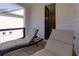 Comfortable lounge chairs on a private balcony, with a door leading inside at 451 Burton Dr # 32, Alpharetta, GA 30009