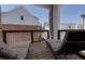 A relaxing balcony features two lounge chairs overlooking the neighborhood at 451 Burton Dr # 32, Alpharetta, GA 30009
