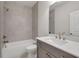 Bathroom featuring a shower-tub combination and sleek vanity with a mirror at 451 Burton Dr # 32, Alpharetta, GA 30009