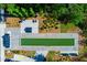 Aerial view of a bocce ball court and outdoor seating areas surrounded by lush landscaping at 451 Burton Dr # 32, Alpharetta, GA 30009