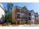 Handsome brick townhome featuring two balconies and attached two-car garage at 451 Burton Dr # 32, Alpharetta, GA 30009