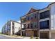 Beautiful brick townhome with two levels of balconies and attached two-car garage at 451 Burton Dr # 32, Alpharetta, GA 30009