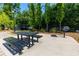 Enjoy outdoor cooking with this grilling station that includes a grill and picnic table at 451 Burton Dr # 32, Alpharetta, GA 30009