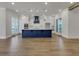 Gourmet kitchen with a large island, stylish pendant lighting, and stainless steel appliances at 451 Burton Dr # 32, Alpharetta, GA 30009
