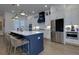 Bright eat-in kitchen features stainless steel appliances, a central island with seating, and ample cabinet space for modern living at 451 Burton Dr # 32, Alpharetta, GA 30009