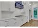 Close up of kitchen featuring stone countertops, stainless appliances, and stylish backsplash at 451 Burton Dr # 32, Alpharetta, GA 30009