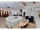 Spacious living area adjacent to kitchen featuring hardwood floors and recessed lighting at 451 Burton Dr # 32, Alpharetta, GA 30009