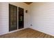 Cozy patio area offering a serene outdoor space and leads into the home's interior, inviting relaxation and privacy at 451 Burton Dr # 32, Alpharetta, GA 30009