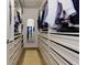 Spacious walk-in closet with custom shelving and a full-length mirror at 451 Burton Dr # 32, Alpharetta, GA 30009