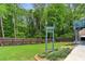 Well-maintained backyard with lush green grass and a wooden privacy fence at 4849 Chapelle Ct, Marietta, GA 30066