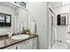 Bathroom with granite vanity and shower behind sliding glass doors at 4849 Chapelle Ct, Marietta, GA 30066