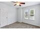 Bedroom with two windows providing natural light and a front door at 4849 Chapelle Ct, Marietta, GA 30066