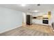 Combined kitchen and living area with modern appliances and stainless steel refrigerator at 4849 Chapelle Ct, Marietta, GA 30066