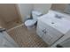 Bathroom features a tiled shower, vanity with storage, and tiled floor at 1349 Cedar Heights Dr, Stone Mountain, GA 30083