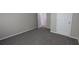 Neutral bedroom area with gray walls and plush carpet flooring at 1349 Cedar Heights Dr, Stone Mountain, GA 30083