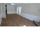 Open living room area with white trim, hardwood floors, and french doors at 1349 Cedar Heights Dr, Stone Mountain, GA 30083