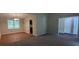 Open-concept living and dining area with neutral paint and updated flooring at 1349 Cedar Heights Dr, Stone Mountain, GA 30083