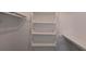 Spacious walk-in closet with shelving unit, rod, and built-in desk area at 1349 Cedar Heights Dr, Stone Mountain, GA 30083