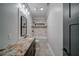 Modern bathroom with granite counters and a tub shower at 16 Mountain Creek Ne Trl, Fairmount, GA 30139