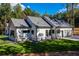 Beautiful home exterior featuring a well-manicured lawn, a garage, and a stone foundation at 16 Mountain Creek Ne Trl, Fairmount, GA 30139