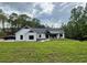 Lovely single Gathering home on a large lot featuring a brick facade and a well-manicured lawn at 16 Mountain Creek Ne Trl, Fairmount, GA 30139