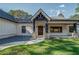 Close up of the home's front porch showing stone columns and wood door at 16 Mountain Creek Ne Trl, Fairmount, GA 30139