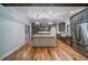 Spacious kitchen showcasing a large island, stainless steel appliances, and custom cabinetry at 16 Mountain Creek Ne Trl, Fairmount, GA 30139