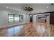 Open living room with window and hardwood floors at 16 Mountain Creek Ne Trl, Fairmount, GA 30139