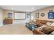 Cozy basement with large screen and comfortable seating at 2710 Irwin Ct, Cumming, GA 30041
