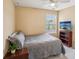 Bedroom with a television, comfortable full bed, neutral colors, and a window at 2710 Irwin Ct, Cumming, GA 30041