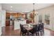 Bright dining area next to the kitchen features stainless appliances and outdoor access at 2710 Irwin Ct, Cumming, GA 30041