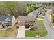 Charming brick home with manicured landscaping and inviting front porch, blending curb appeal and comfort at 2710 Irwin Ct, Cumming, GA 30041